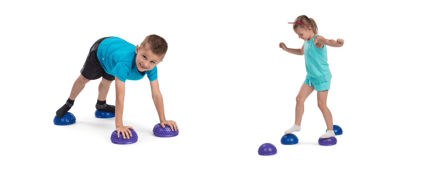 Kids Using a Set of Six Balance Pods